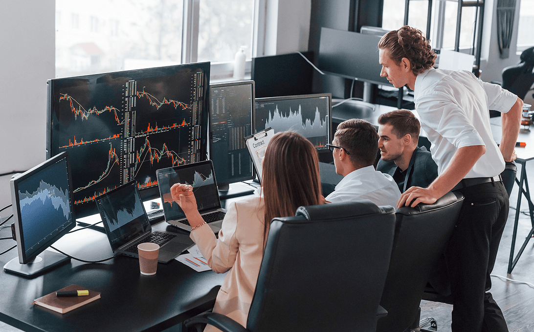 AIFO team in a modern trading office